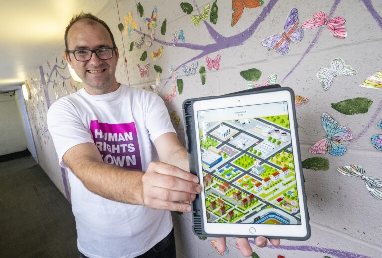 Man holds tablet