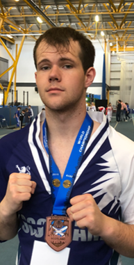 Lewis McDermott with medal