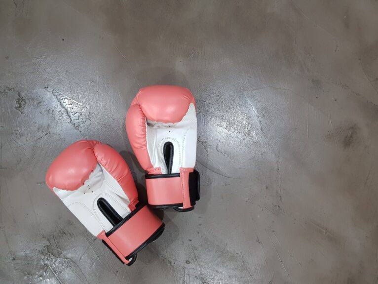 Boxing gloves on a stone floor
