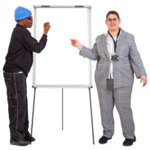 Image of two people writing on a blank flip chart